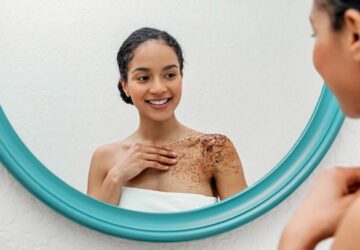 Woman Applying Coffee Bean Body